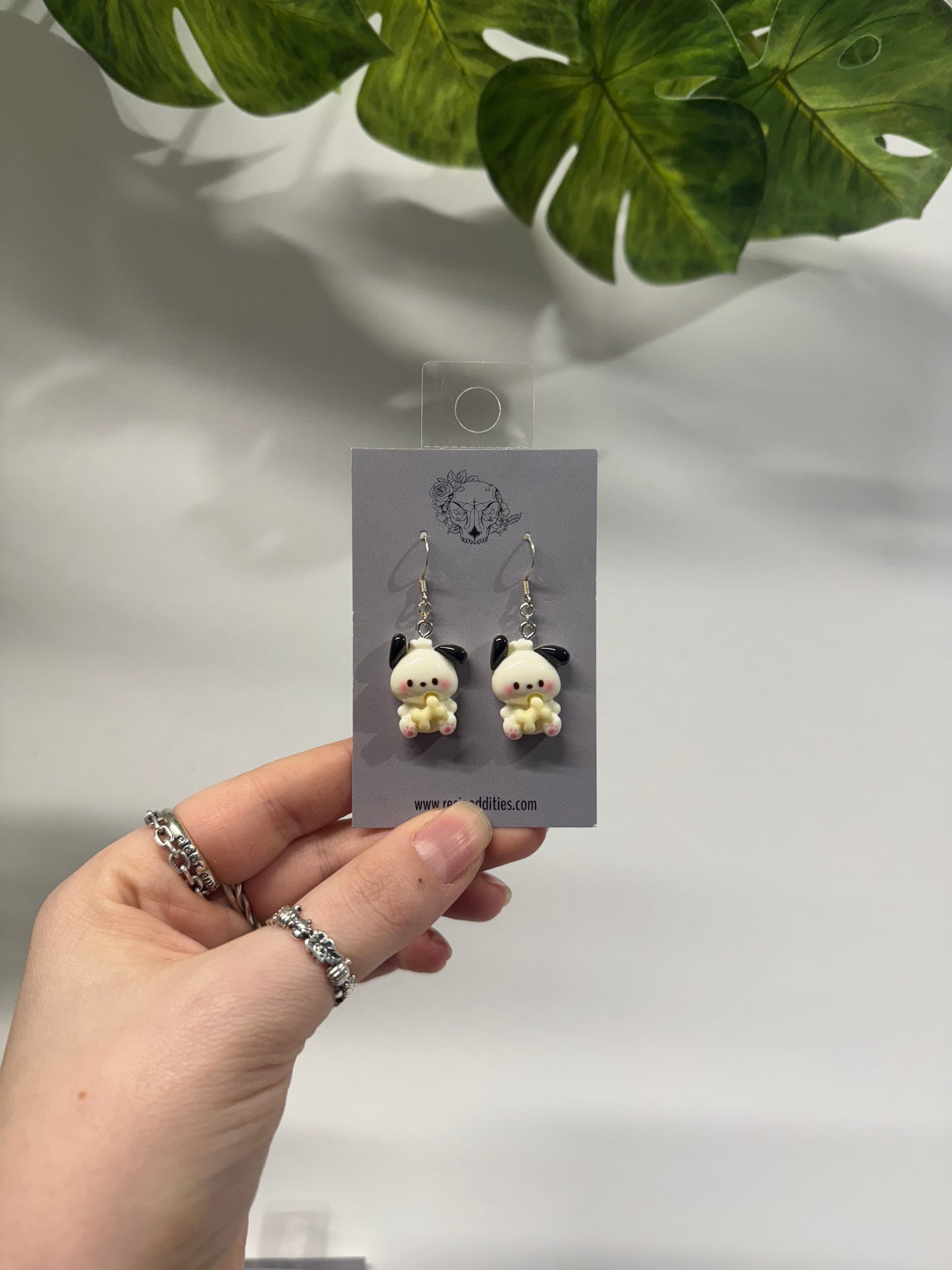 Sitting Pocha Acrylic Earrings